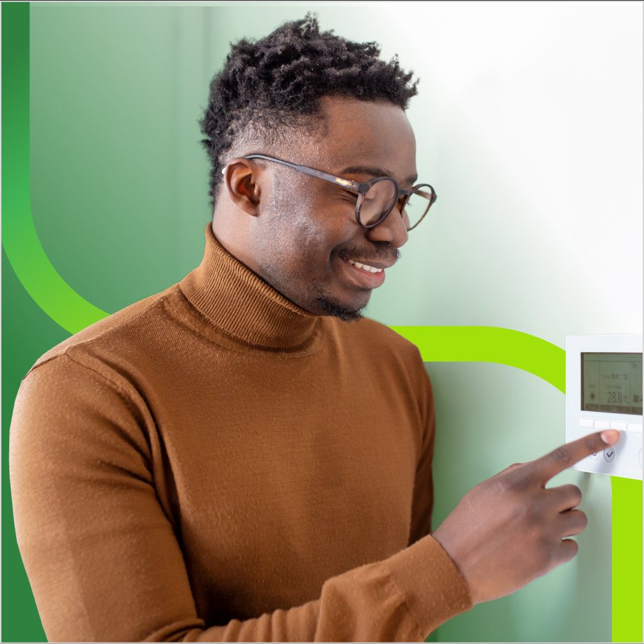 Person adjusting thermostat